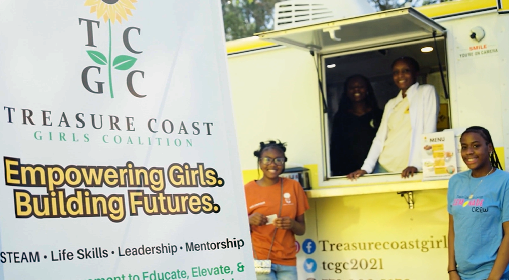 GHCOP Partner Agency - Treasure Coast Girls Coalition members and coordinators standing near their food truck